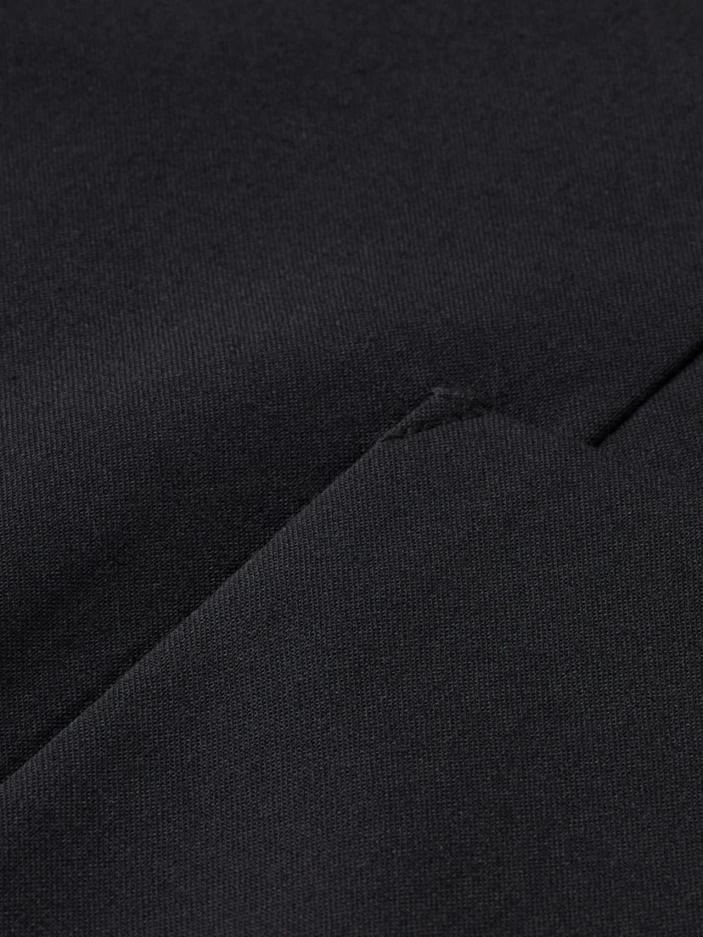 core-unconstructed-peak-lapel-cool-wool-blazer-black detail shot by Scotch & Soda