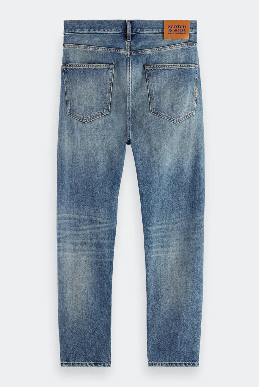 Loose Tapered Jeans flat lay back view by Scotch & Soda