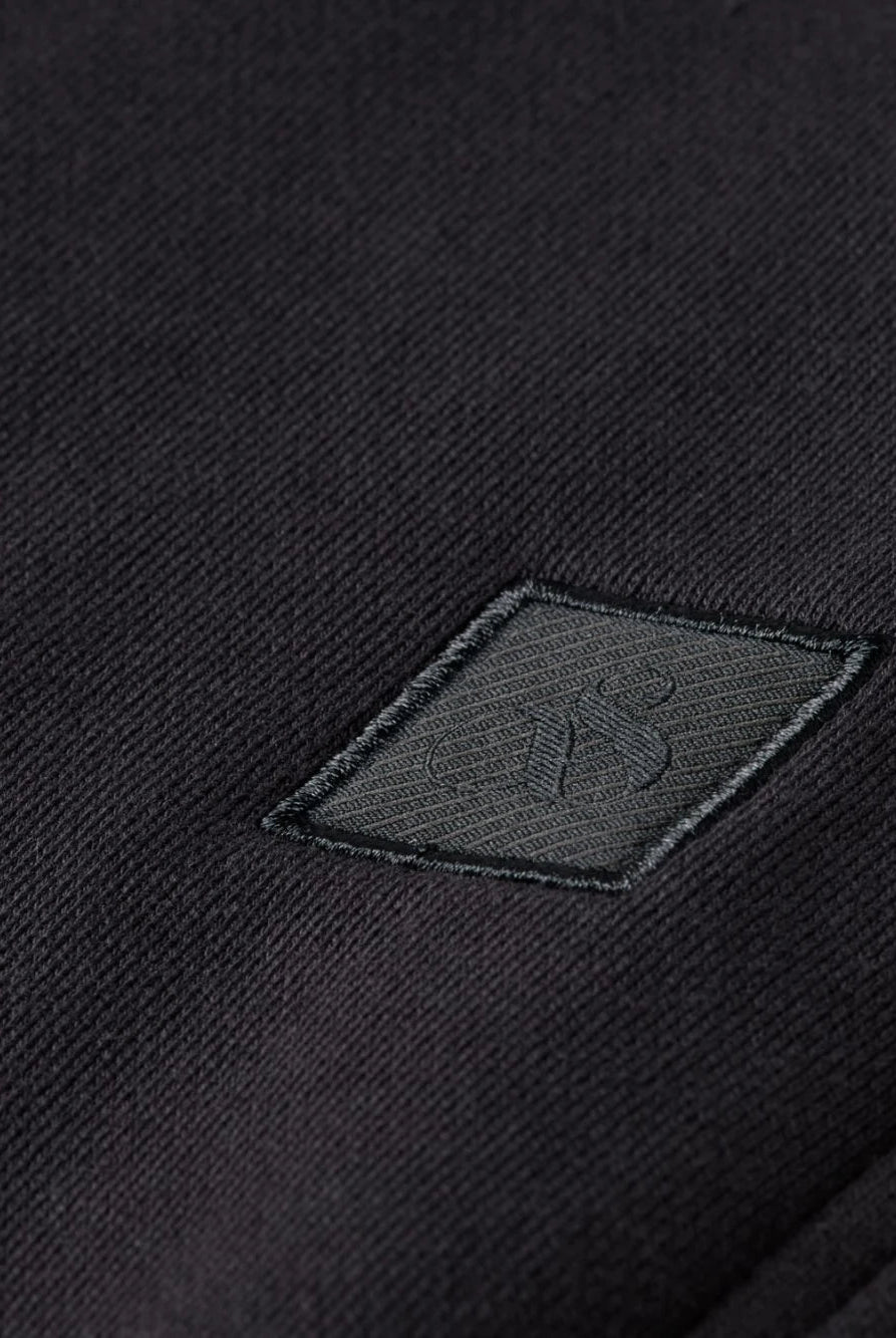 core-logo-sweatpant detail shot by Scotch & Soda