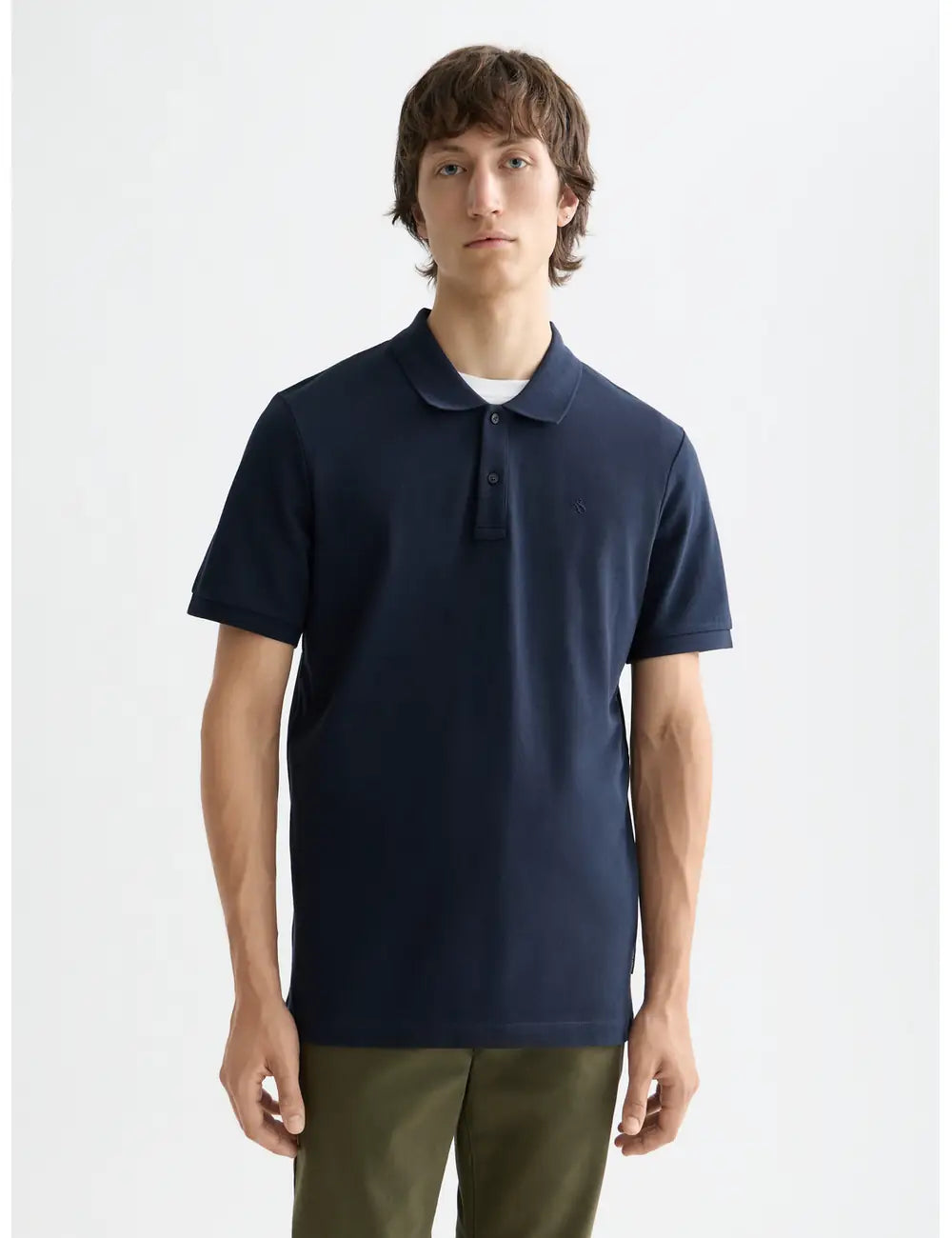 Logo Pique Polo close-up on model showing fit and detail by Scotch & Soda