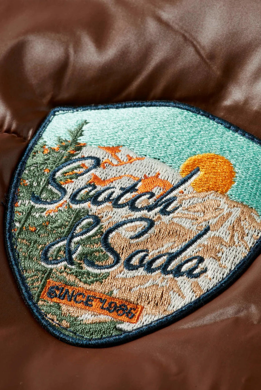 lacquer-puffer-jacket detail shot by Scotch & Soda