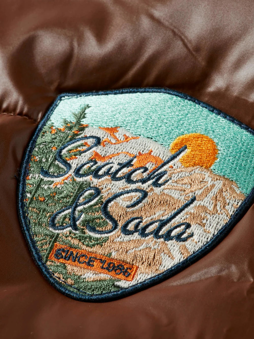 lacquer-puffer-jacket detail shot by Scotch & Soda