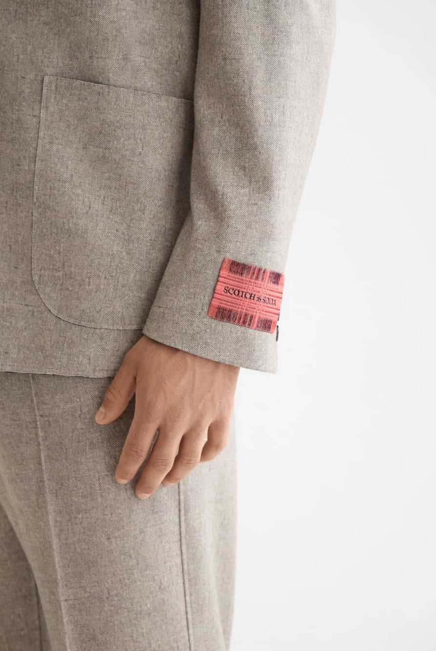 unconstructed-melange-jersey-relaxed-fit-blazer detail shot by Scotch & Soda