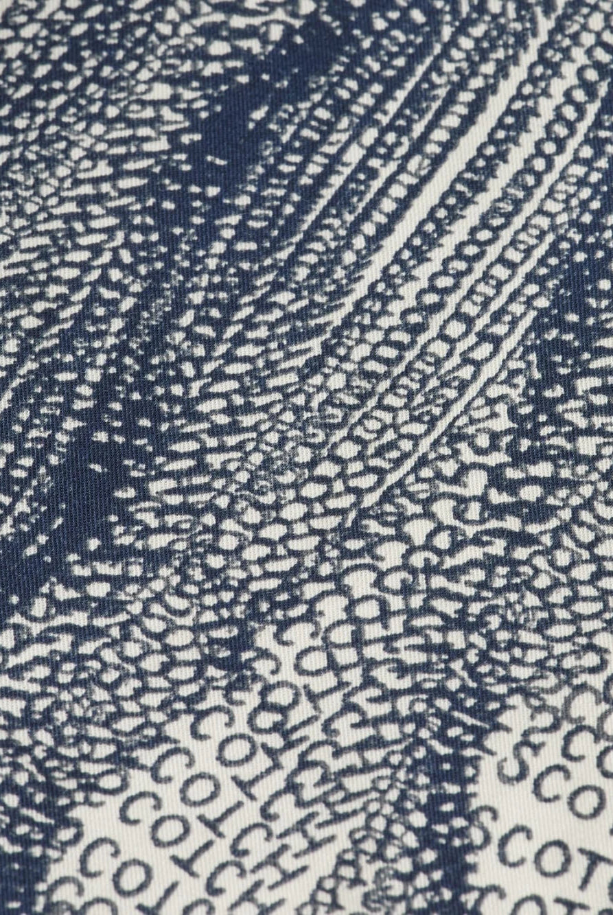 printed-tencel-regular-fit-bermuda-short detail shot by Scotch & Soda