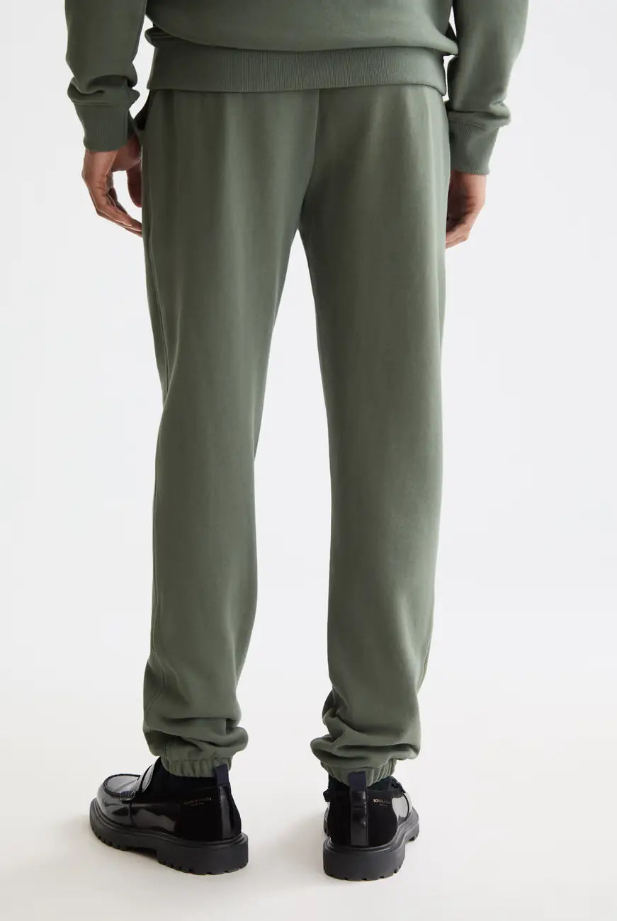 Logo Badge Sweatpants detail shot showing fabric and craftsmanship by Scotch & Soda