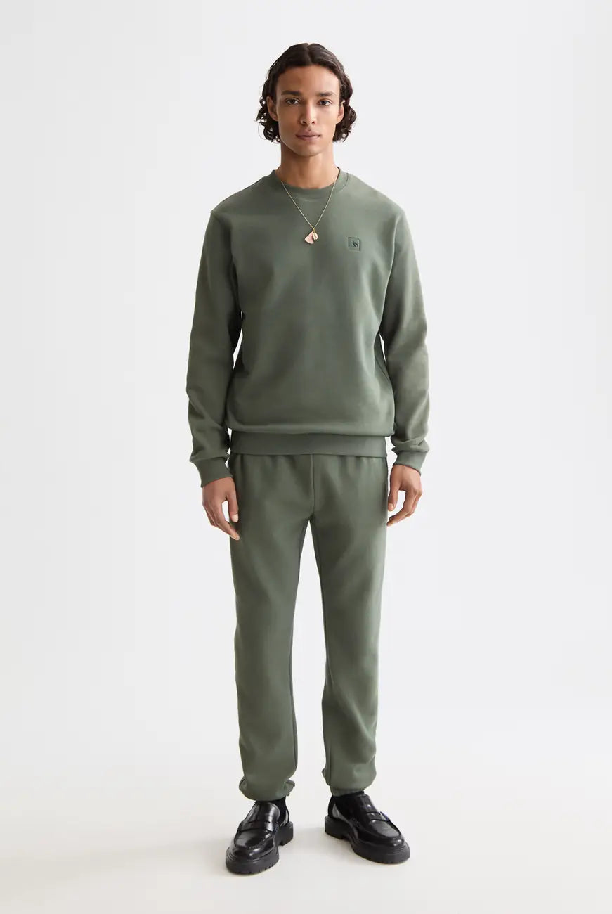 Logo Badge Sweatpants full model shot showing overall fit by Scotch & Soda