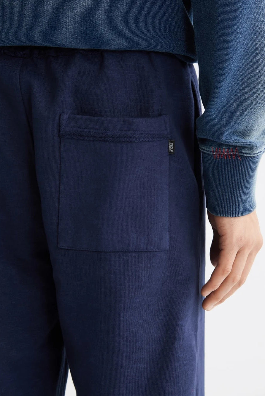 seasonal-core-3-crosses-garment-dye-sweatpants detail shot by Scotch & Soda