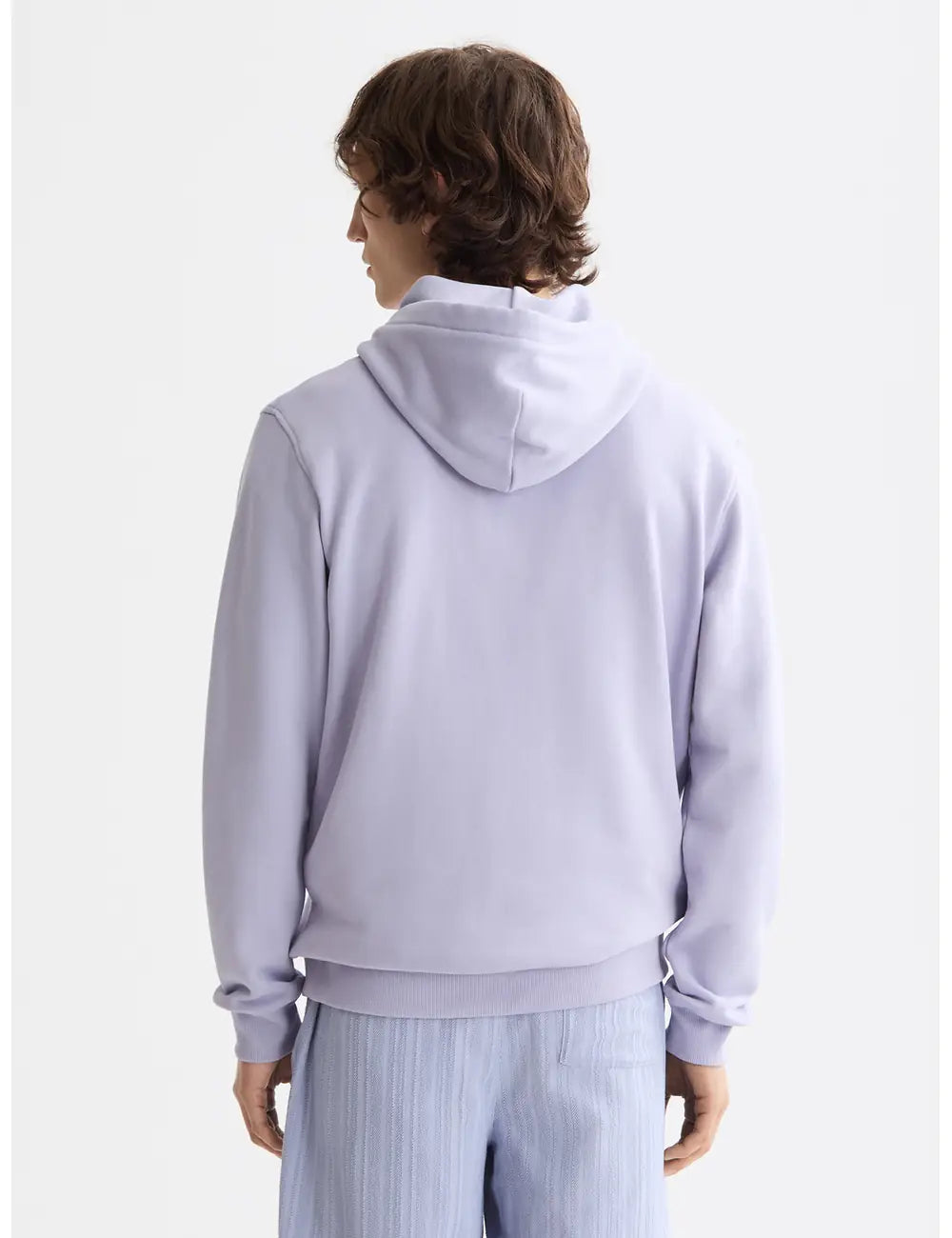 Logo Badge Hoodie detail shot showing fabric and craftsmanship by Scotch & Soda