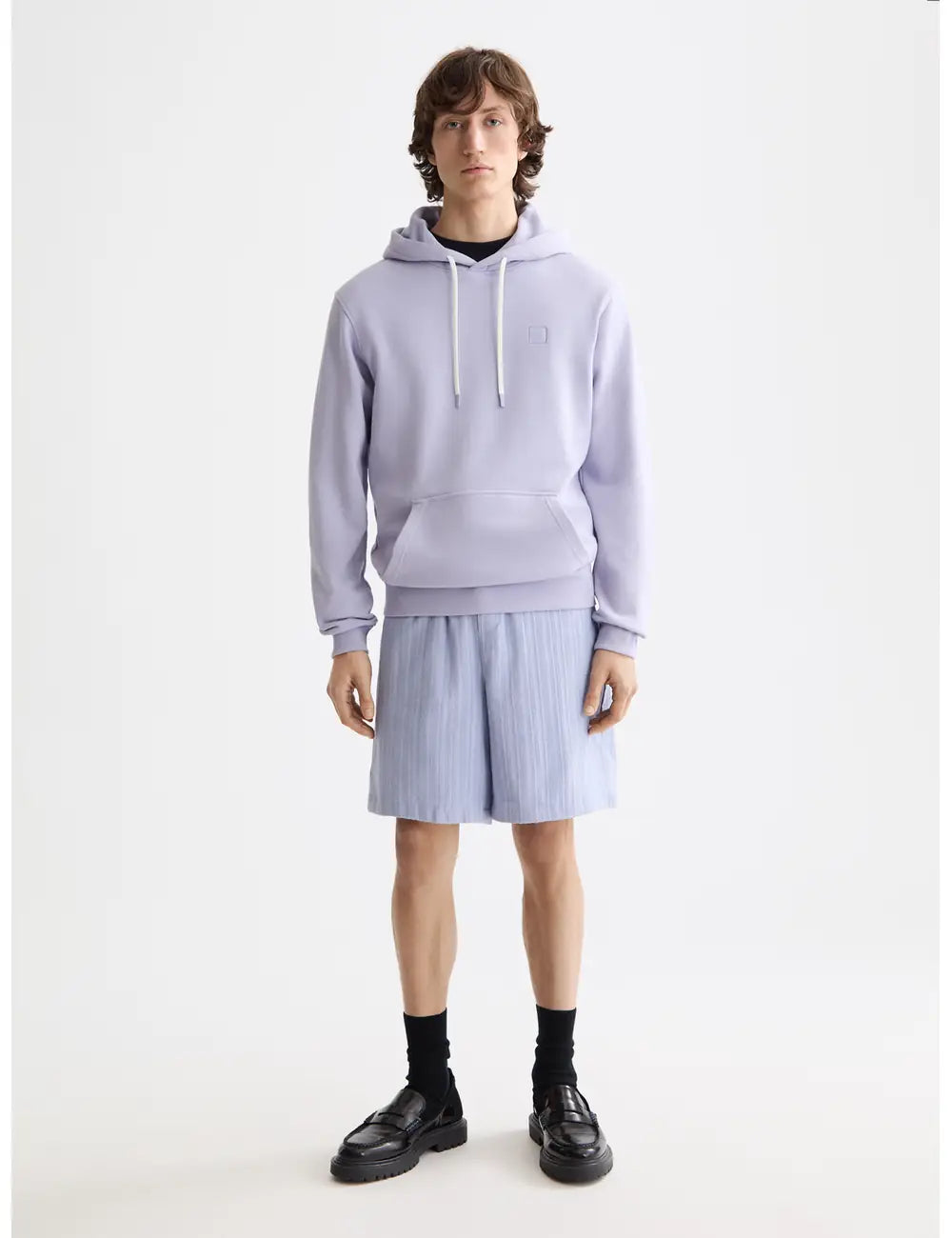 Logo Badge Hoodie full model shot showing overall fit by Scotch & Soda