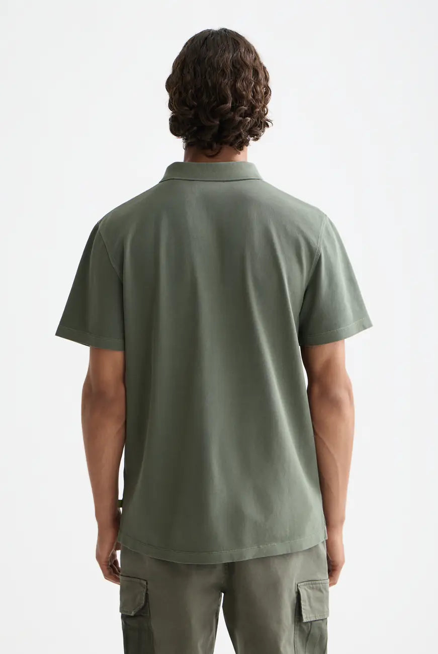 Pique Relaxed Polo detail shot showing fabric and craftsmanship by Scotch & Soda