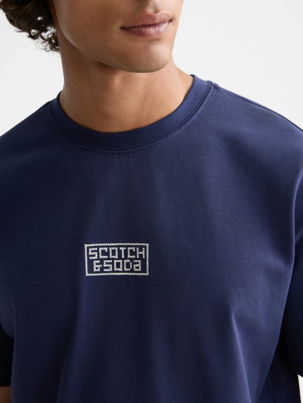 relaxed-fit-cross-stitch-artwork-t-shirt detail shot by Scotch & Soda