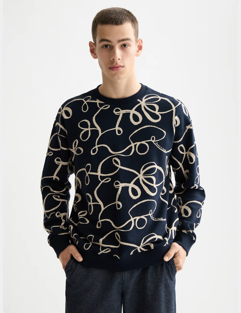 Aop Sweatshirt close-up on model showing fit and detail by Scotch & Soda