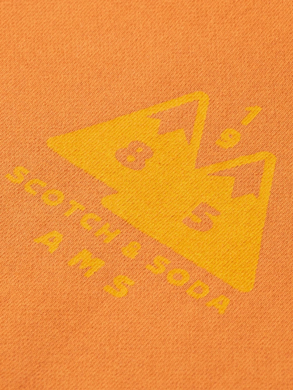 wash-gd-artwork-sweatshirt detail shot by Scotch & Soda