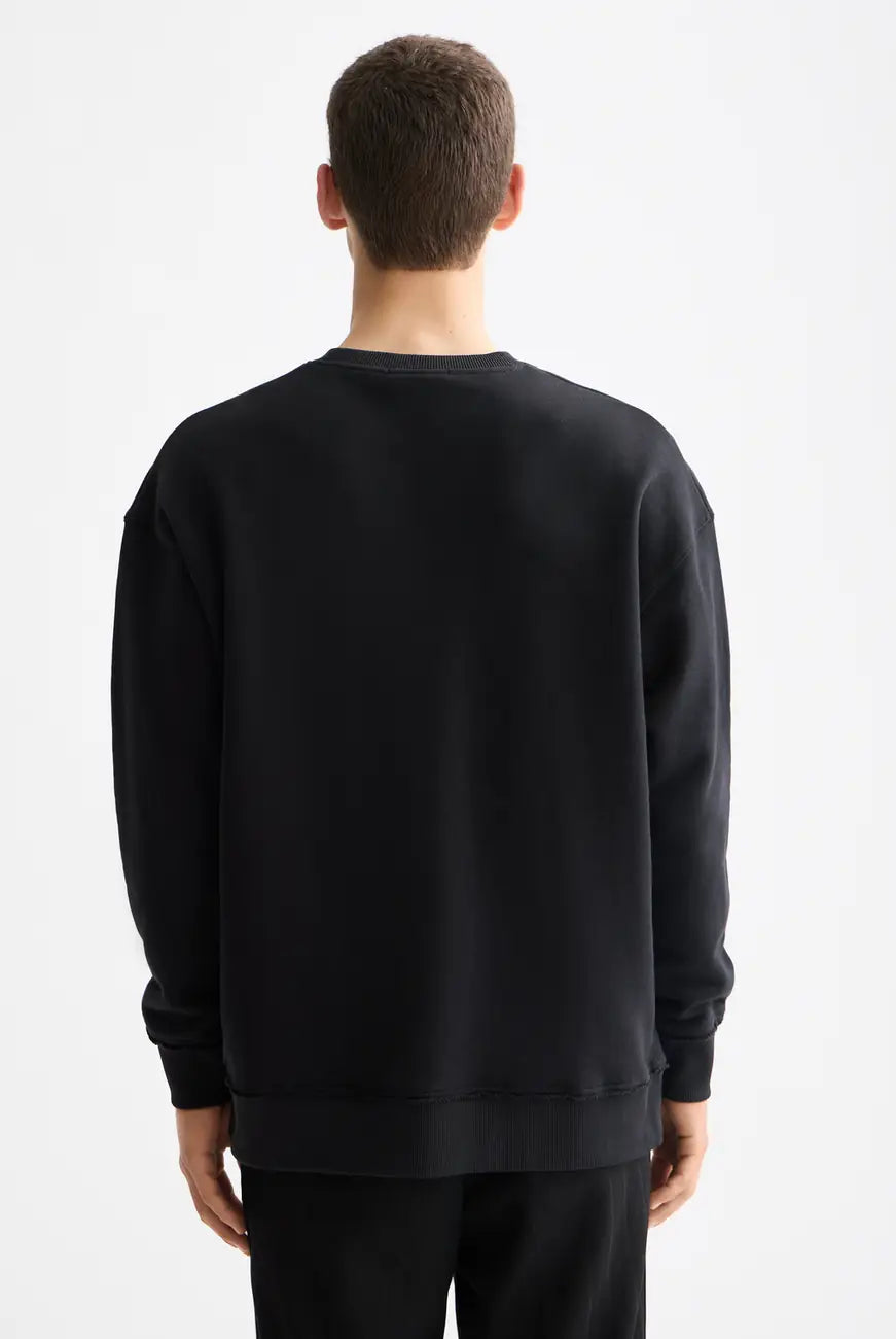 Loose Fit Sweatshirt detail shot showing fabric and craftsmanship by Scotch & Soda