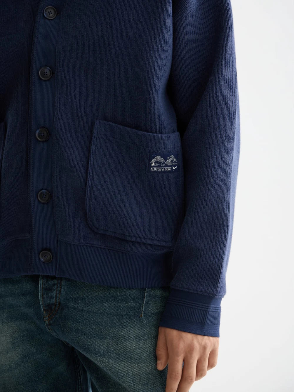 loose-fit-button-down-sweatshirt detail shot by Scotch & Soda