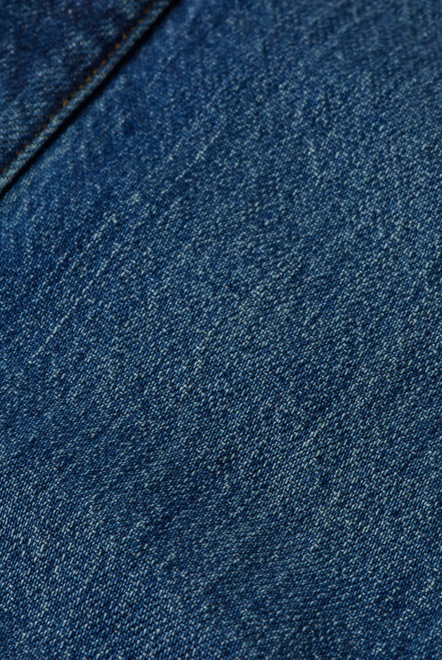 denim-trucker-jacket-let-it-rain-750-years-celebration detail shot by Scotch & Soda
