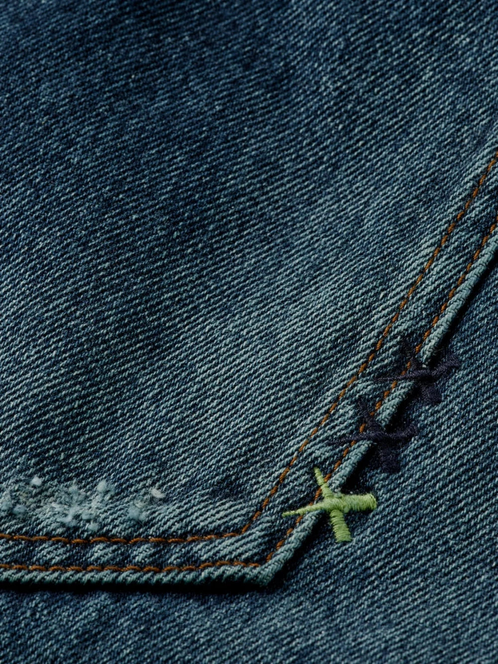 Dean Loose Tapered Jeans—Green Touch detail shot of fabric and craftsmanship by Scotch & Soda