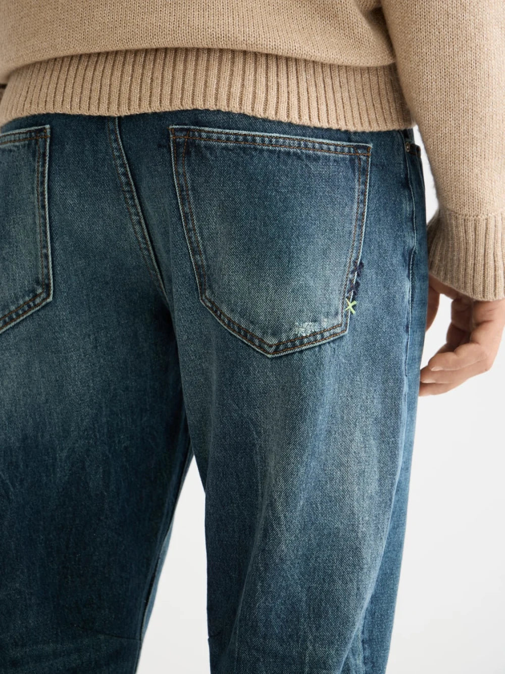 Dean Loose Tapered Jeans—Green Touch detail shot of fabric and craftsmanship by Scotch & Soda