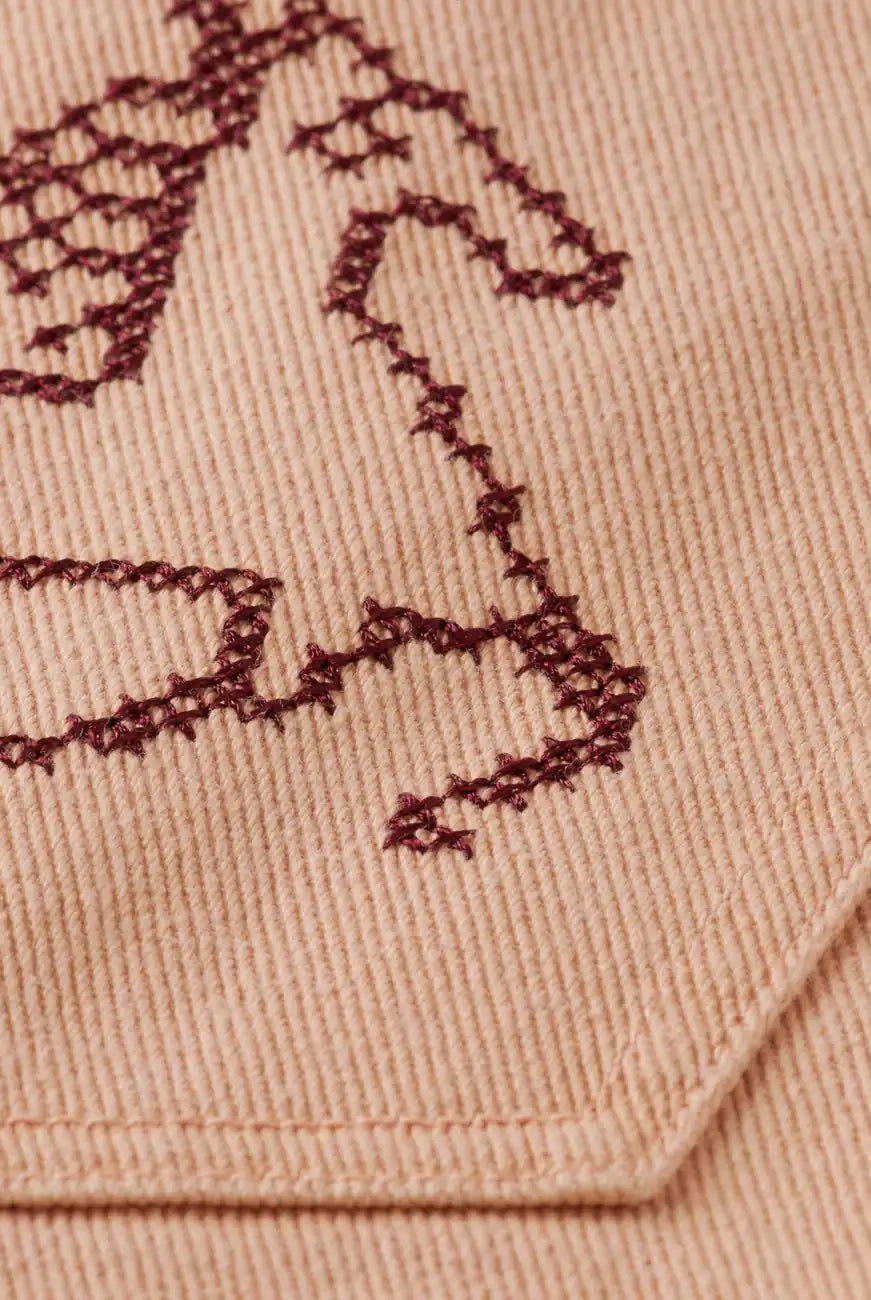 The Ripple - High Rise Straight Leg Pants detail shot of fabric and craftsmanship by Scotch & Soda