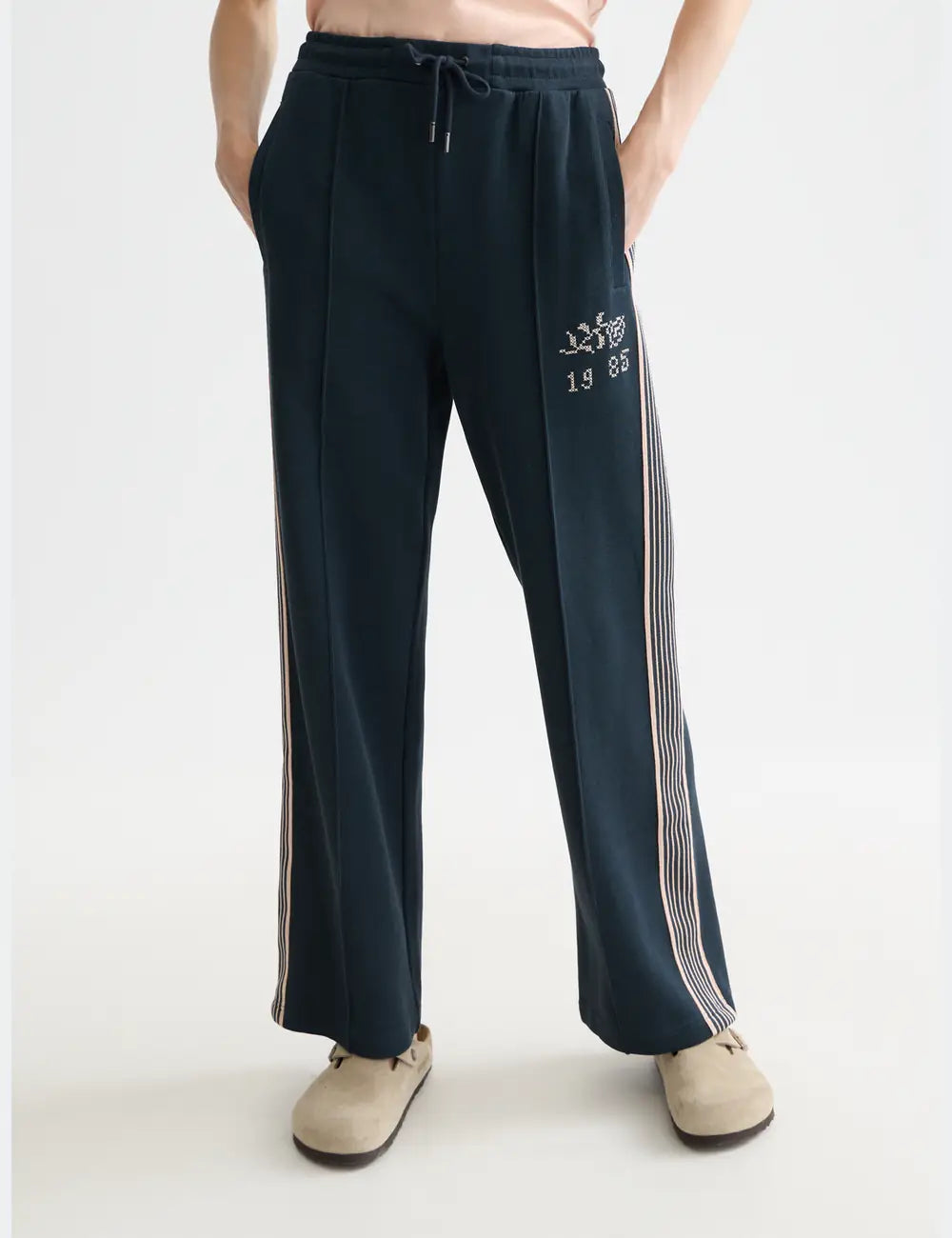 Midnight Iz Interlock Sweatpants close-up on model by Scotch & Soda
