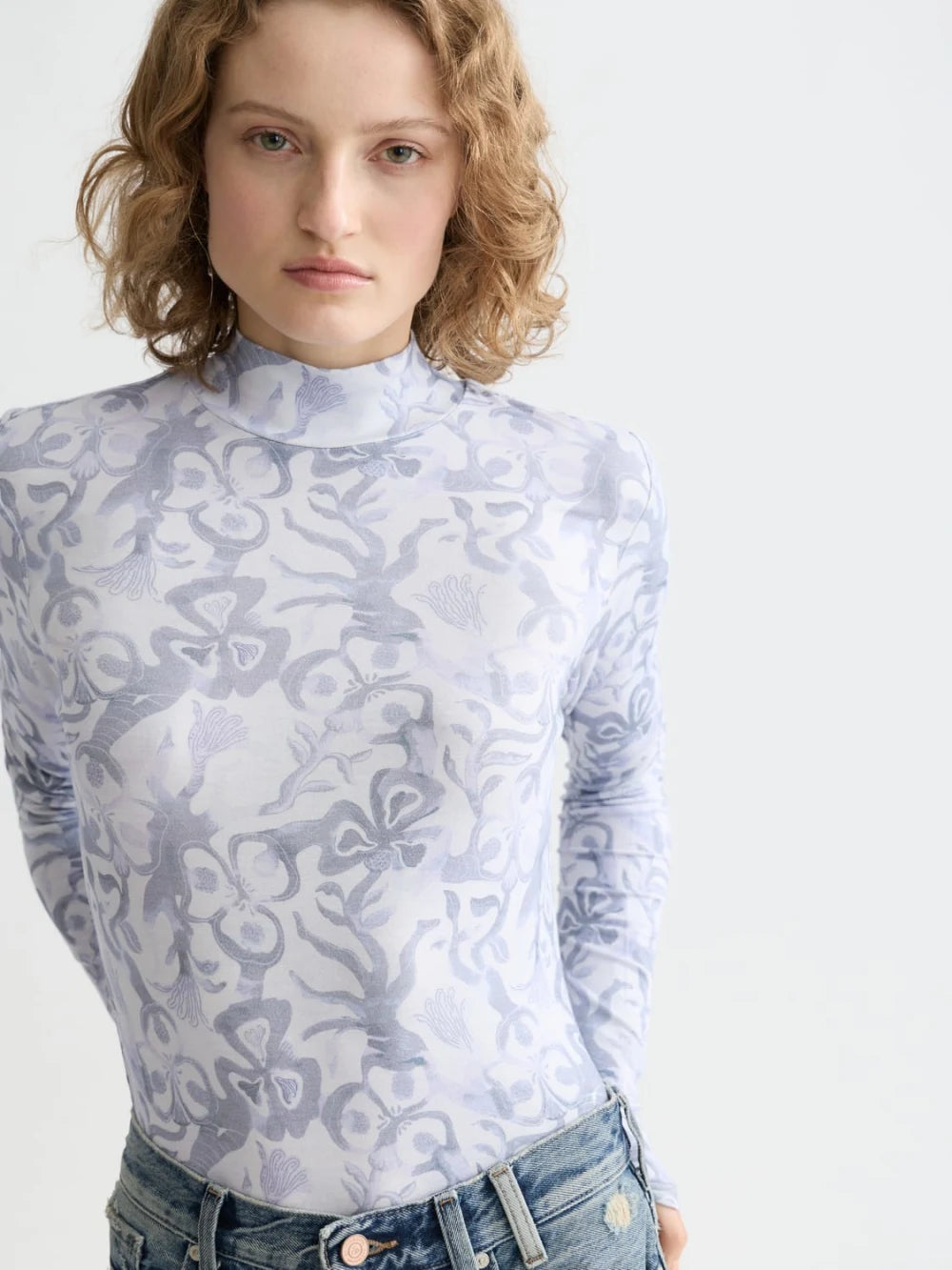 all-over-printed-mock-neck-long-sleeve-t-shirt detail shot by Scotch & Soda