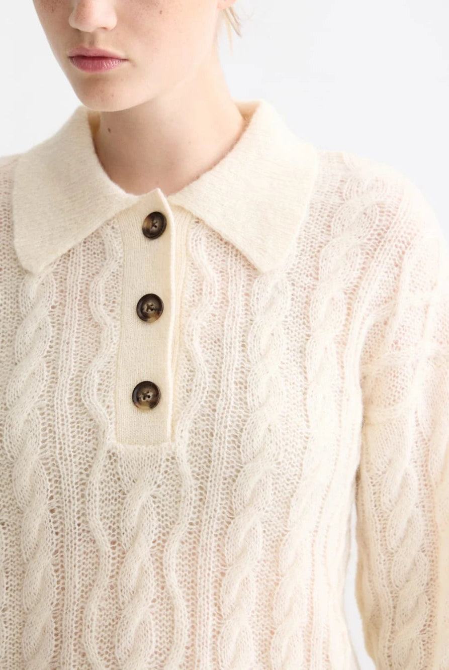 cable-stitch-polo-neck-pullover detail shot by Scotch & Soda