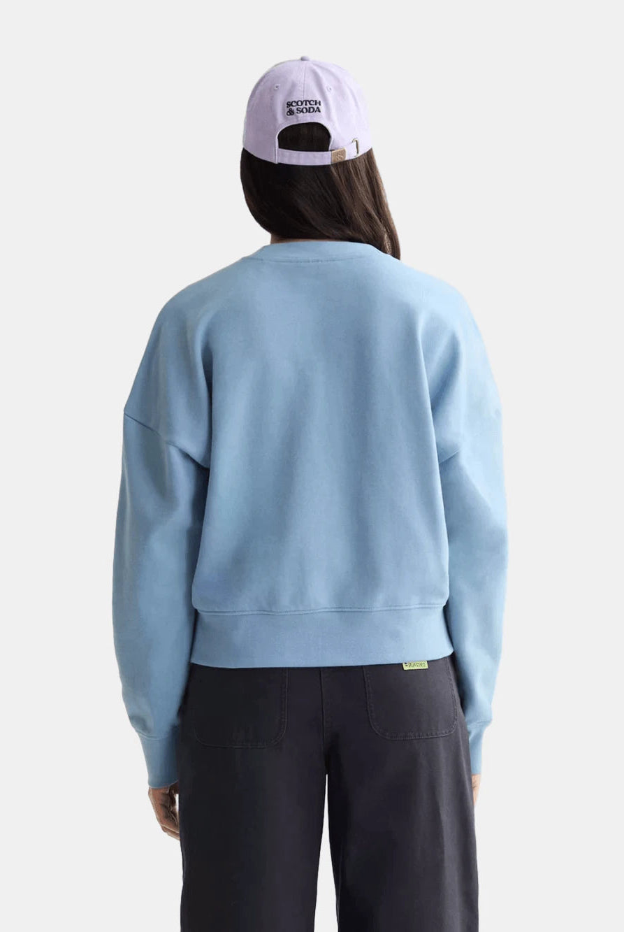 embroidered-logo-relaxed-fit-sweatshirt detail shot by Scotch & Soda