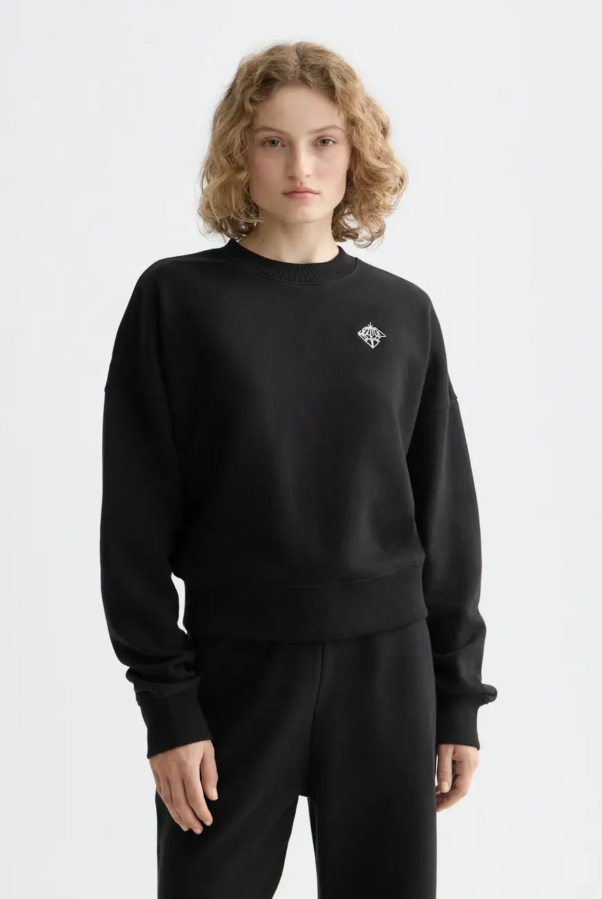 Black Core Embroidered Logo Sweat-shirt close-up on model by Scotch & Soda
