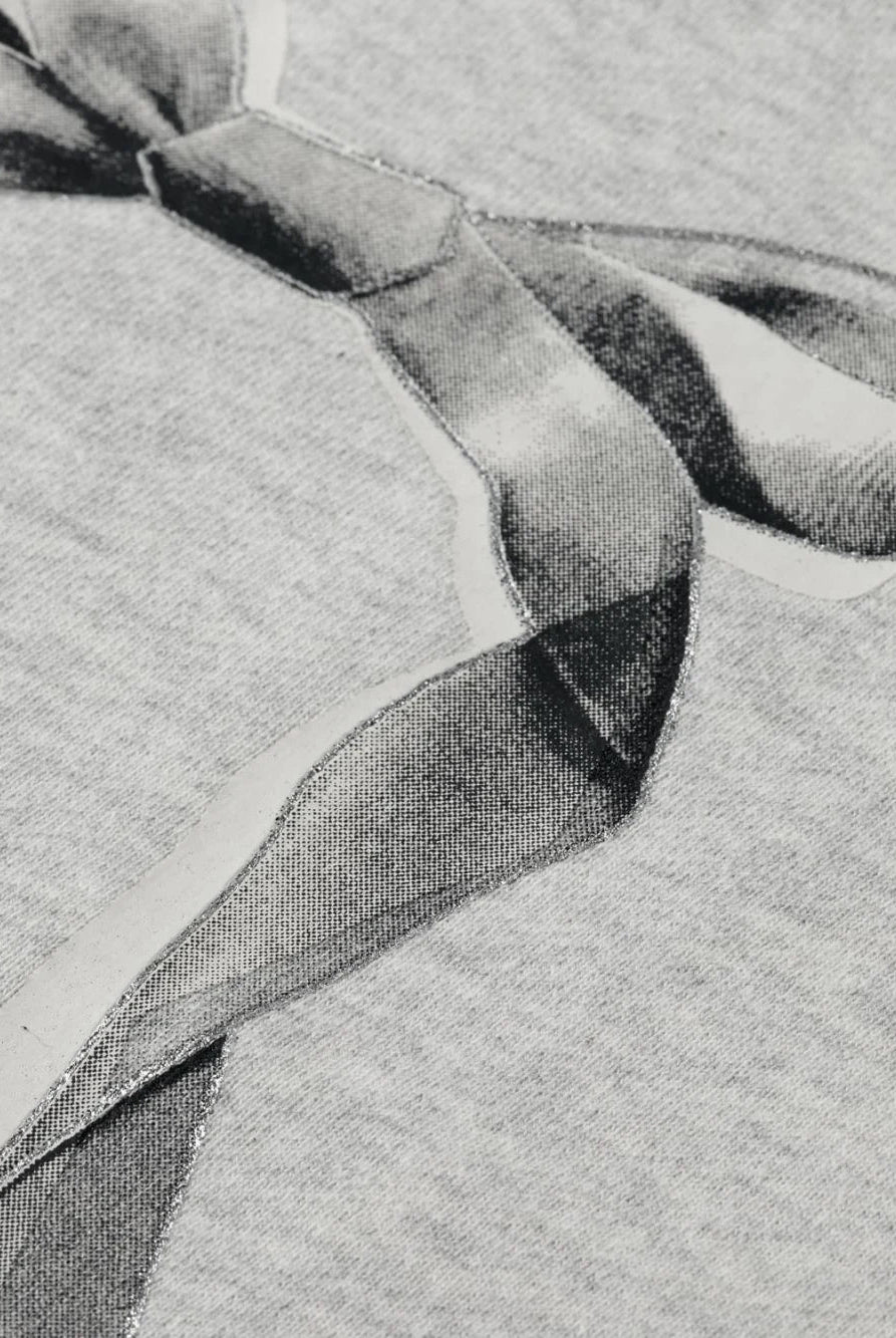 chest-artwork-relaxed-sweatshirt detail shot by Scotch & Soda