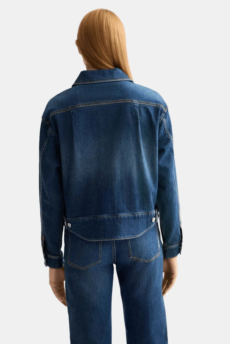 cropped-denim-jacket-let-it-rain-750-year-celebration detail shot by Scotch & Soda