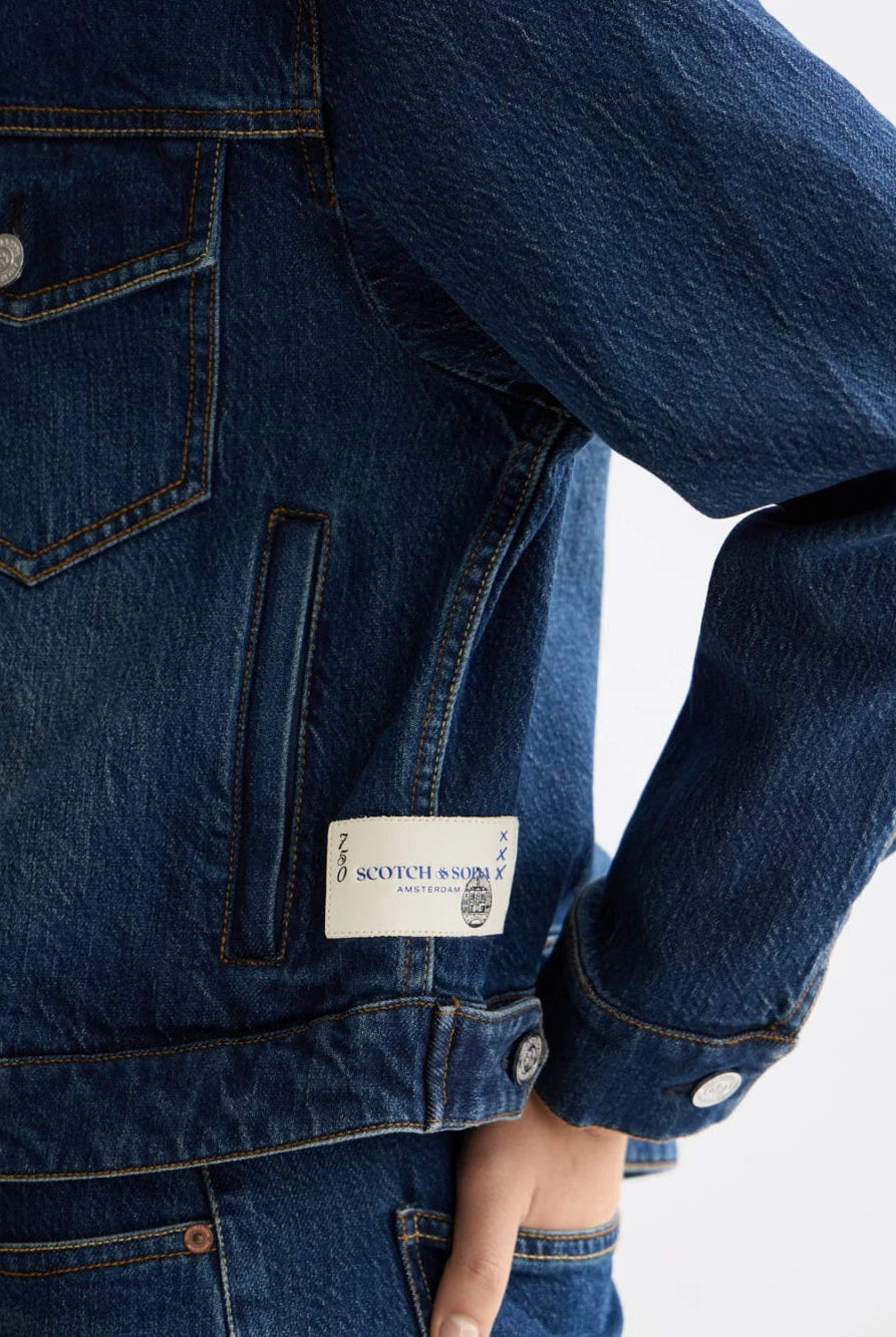 cropped-denim-jacket-let-it-rain-750-year-celebration detail shot by Scotch & Soda