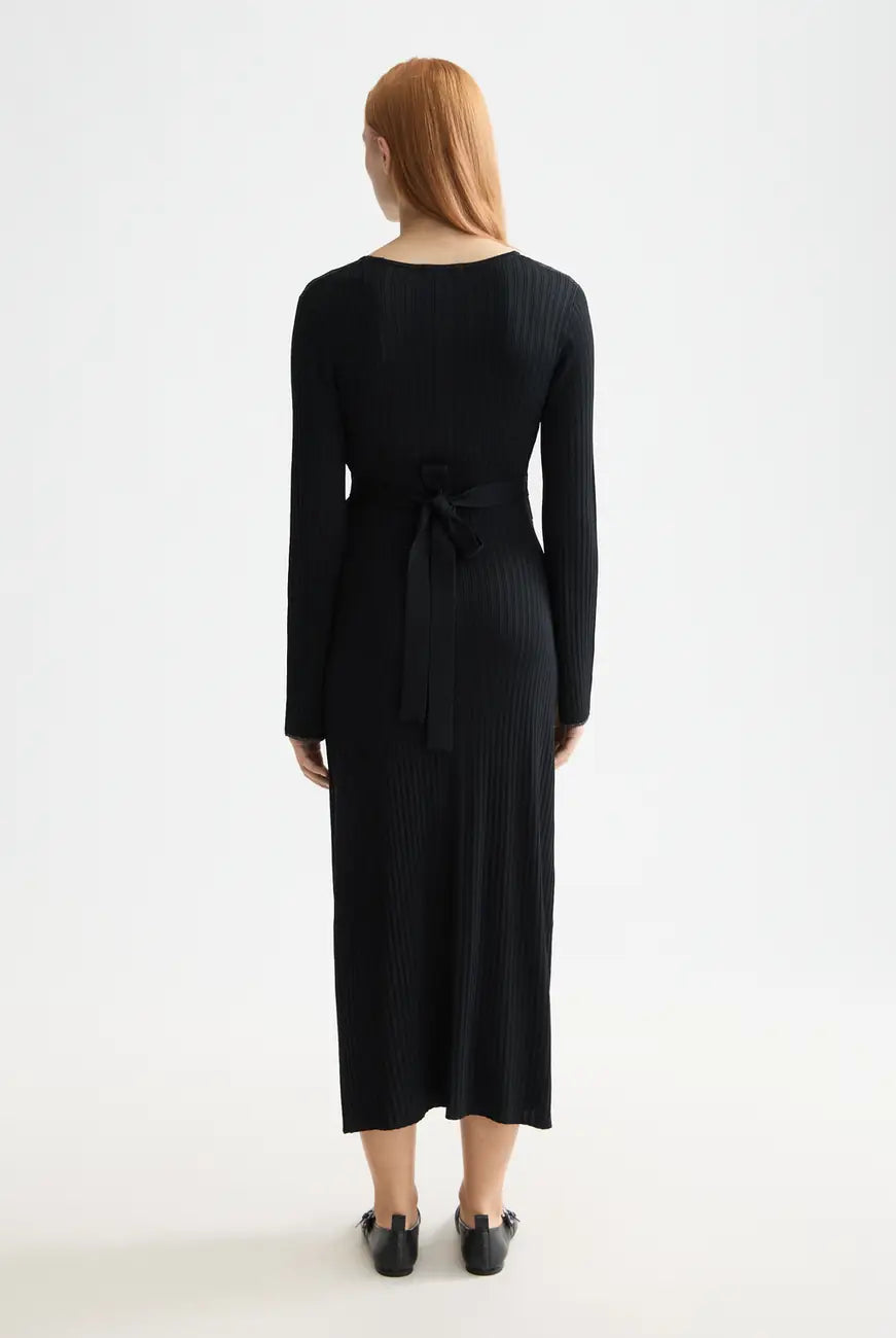 Skinny Rib Wrap Dress detail shot showing fabric and craftsmanship by Scotch & Soda