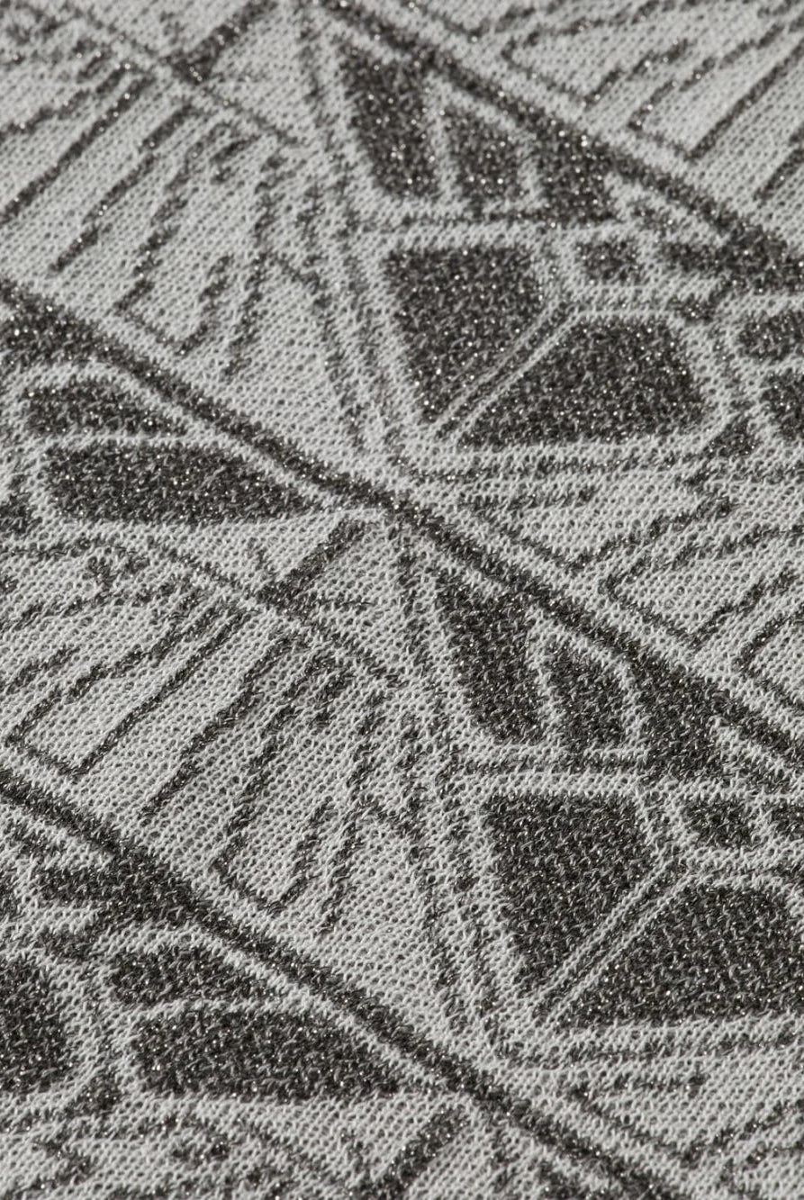 monogram-jacquard-knitted-trousers detail shot by Scotch & Soda