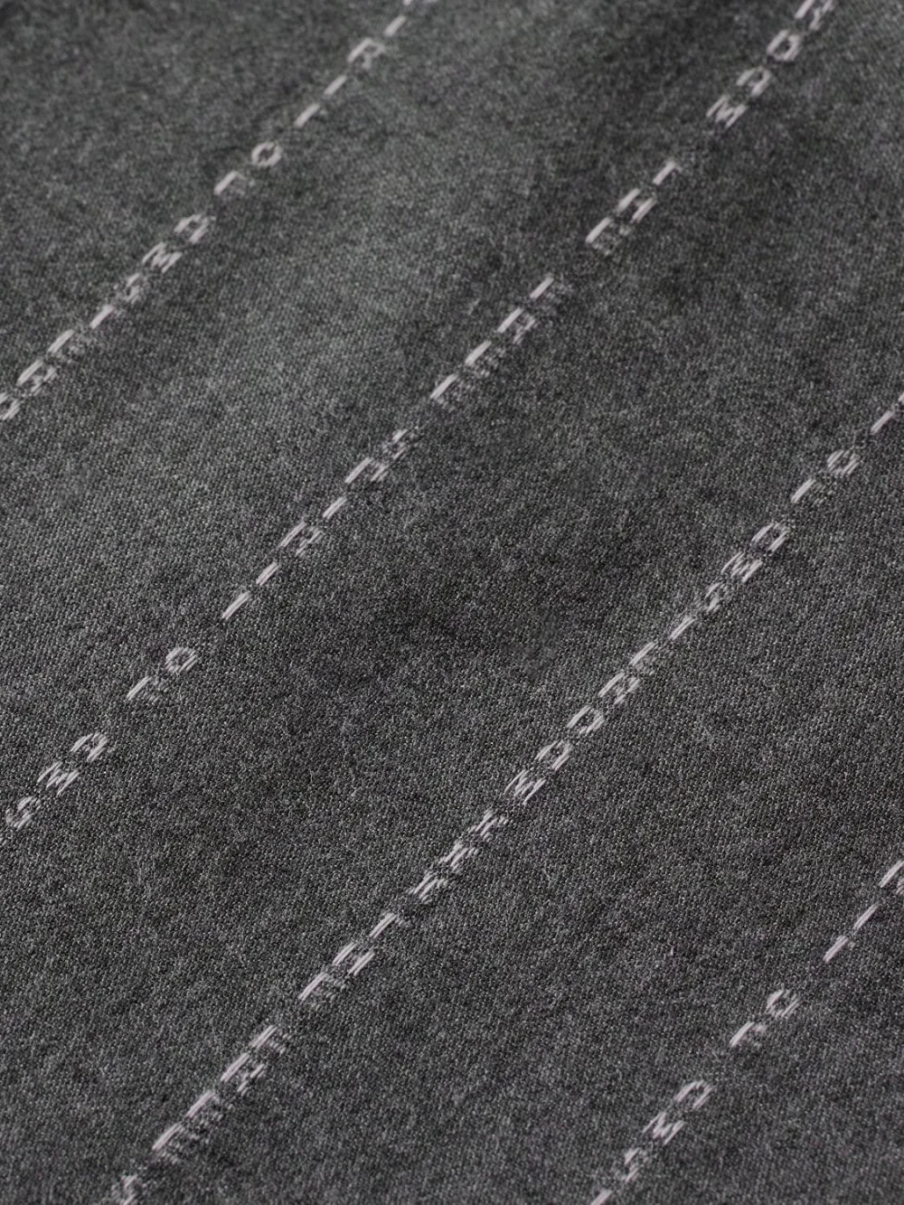 quinn-pinstripe-mid-rise-pleat-front-wide-leg-pant detail shot by Scotch & Soda