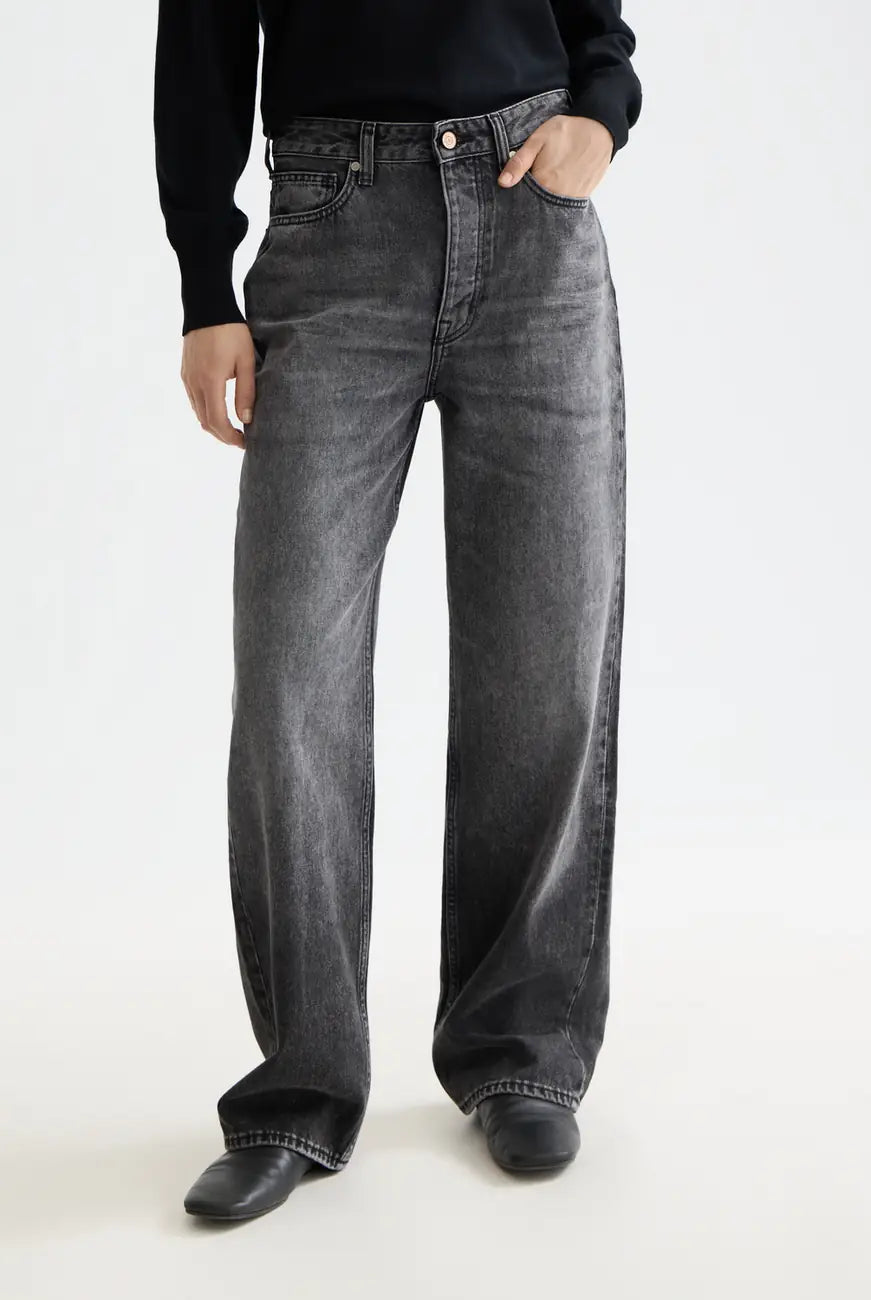 Absolute Black Core Ripple Straight Jeans — Absolute Black close-up on model by Scotch & Soda