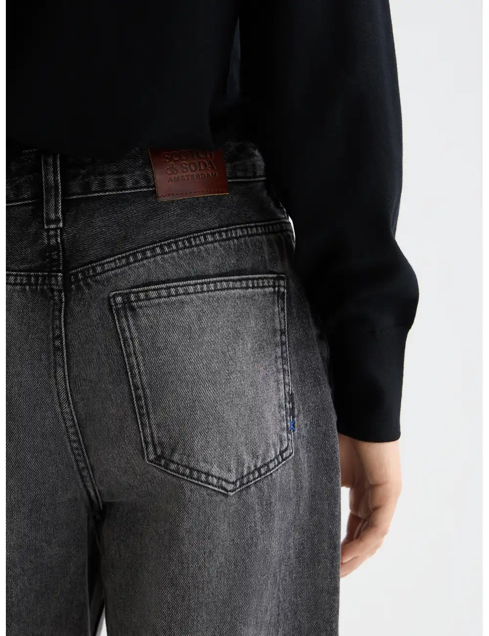 Core Ripple Straight Jeans — Absolute Black detail shot of fabric and craftsmanship by Scotch & Soda