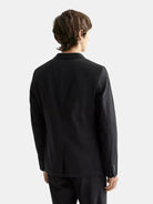 core-unconstructed-peak-lapel-cool-wool-blazer-black back view by Scotch & Soda
