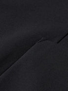 core-unconstructed-peak-lapel-cool-wool-blazer-black detail shot by Scotch & Soda