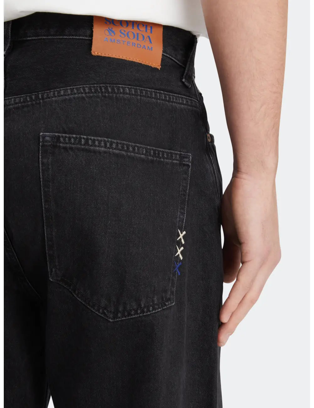 Loose Fit Jeans detail shot showing fabric and craftsmanship by Scotch & Soda