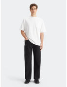 Loose Fit Jeans full model shot showing overall fit by Scotch & Soda