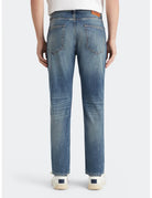 Loose Tapered Jeans detail shot showing fabric and craftsmanship by Scotch & Soda