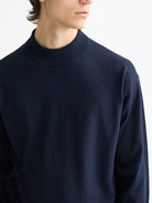 core-dropped-shoulder-mock-neck-pullover-navy detail shot by Scotch & Soda