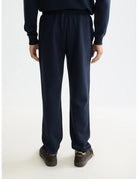 Logo Sweatpant detail shot showing fabric and craftsmanship by Scotch & Soda