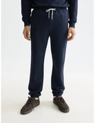 Logo Sweatpant close-up on model showing fit and detail by Scotch & Soda