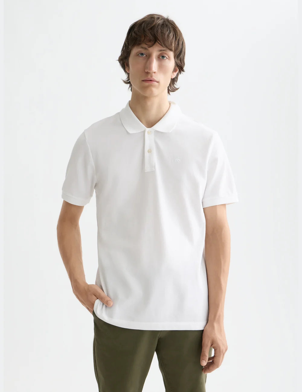Logo Pique Polo close-up on model showing fit and detail by Scotch & Soda
