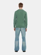 The Beat Bootcut Jeans  Vintage Touch (Navy) on model showing fit and styling by Scotch & Soda
