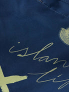 Printed Long-Length Swimshort (Navy) detail shot of fabric and craftsmanship by Scotch & Soda