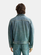denim-trucker-jacket-with-contrast-panelling back view by Scotch & Soda