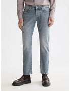 Zee Straight Jeans close-up on model showing fit and detail by Scotch & Soda