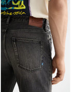 Beat Boot Cut Jeans detail shot showing fabric and craftsmanship by Scotch & Soda